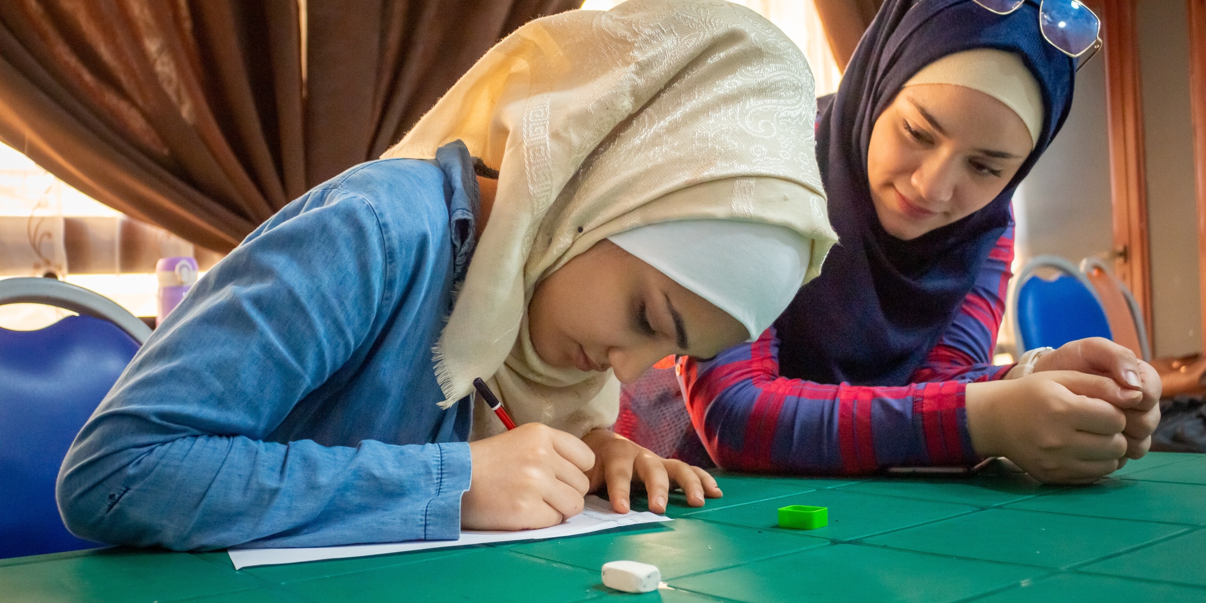 Badiaa, 15, attends her first psychosocial support session at a UNICEF-supported center in Bustan Alzahra, Aleppo city. 2020. Credit: UNICEF/Antwan-Chnkdji